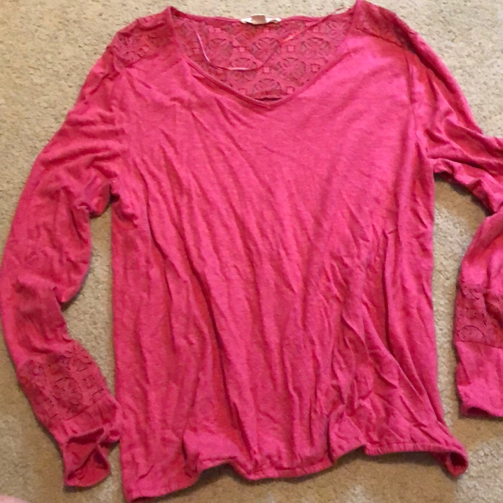 Cute long sleeve top with lacy shoulder and back.
